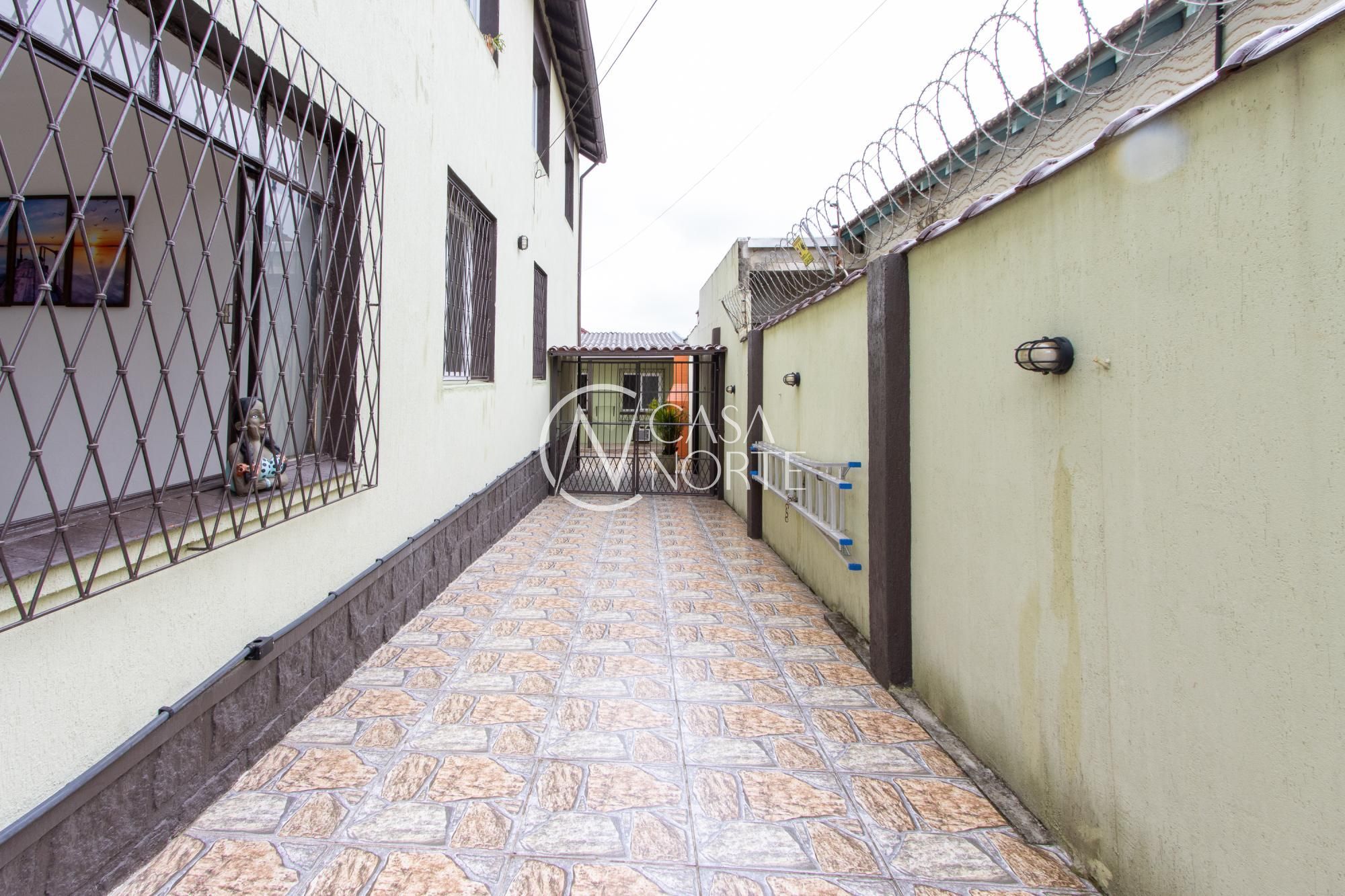 Casa à venda com 6 quartos, 0m², 2 suítes, 4 vagas, Rua Oscar Tollens no bairro Santa Tereza em Porto Alegre