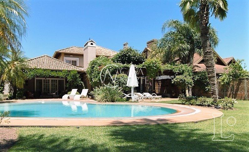 Casa de Condomínio à venda com 3 quartos, 341m², 3 suítes, 2 vagas, Avenida Juca Batista no bairro Terraville em Porto Alegre