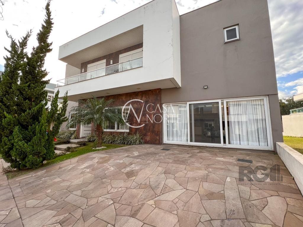 Casa de Condomínio à venda com 3 quartos, 219m², 3 suítes, 2 vagas, Rua Eroni Soares Machado no bairro Hípica em Porto Alegre