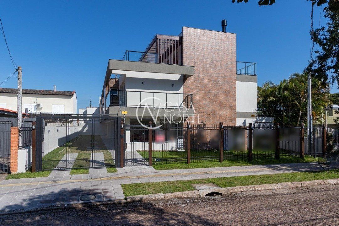Casa de Condomínio à venda com 3 quartos, 306m², 3 suítes, 3 vagas, Avenida Pereira Passos no bairro Vila Assunção em Porto Alegre