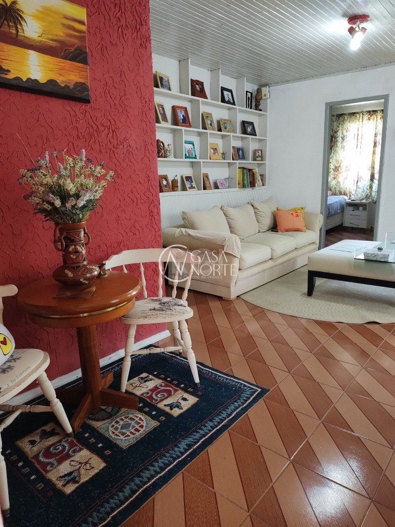 Casa à venda com 3 quartos, 335m², 4 vagas, Rua Martim Minaberry no bairro Partenon em Porto Alegre