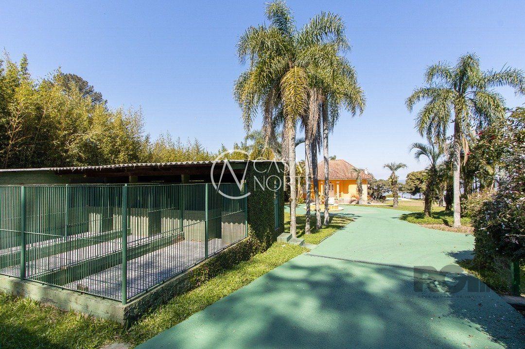 Casa à venda com 4 quartos, 482m², 2 suítes, 20 vagas, Estrada Retiro da Ponta Grossa no bairro Ponta Grossa em Porto Alegre