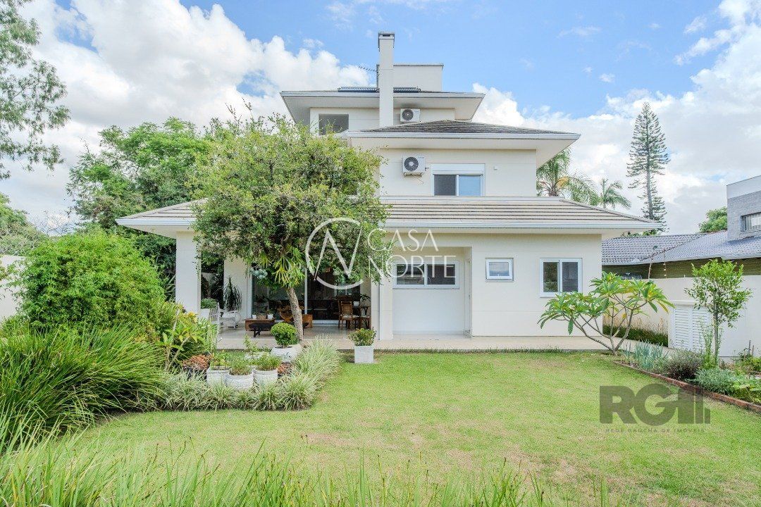 Casa à venda com 3 quartos, 358m², 3 suítes, 4 vagas, Rua Ladislau Neto no bairro Ipanema em Porto Alegre