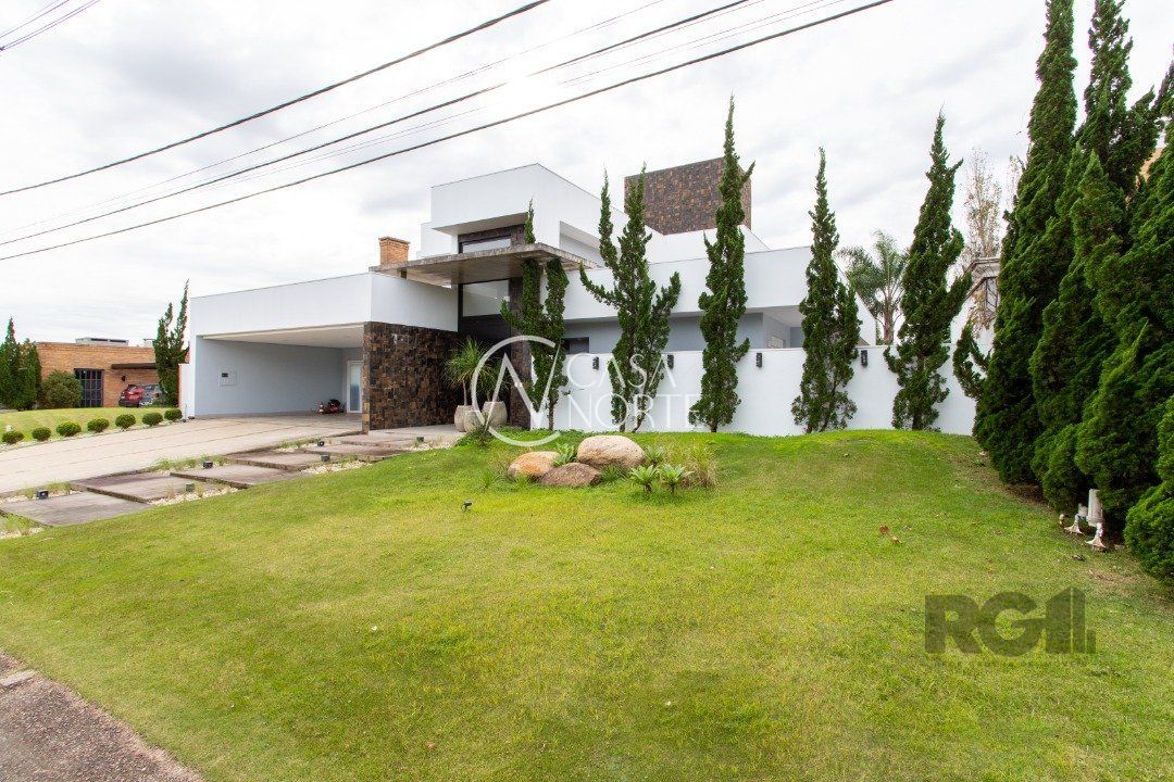 Casa de Condomínio à venda com 4 quartos, 450m², 4 suítes, 3 vagas, Avenida Juca Batista no bairro Chapéu do Sol em Porto Alegre