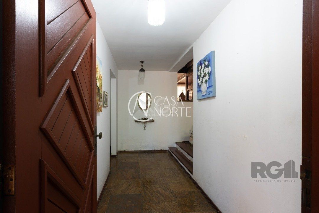 Casa à venda com 4 quartos, 519m², 2 suítes, 4 vagas, Rua Upamaroti no bairro Cristal em Porto Alegre