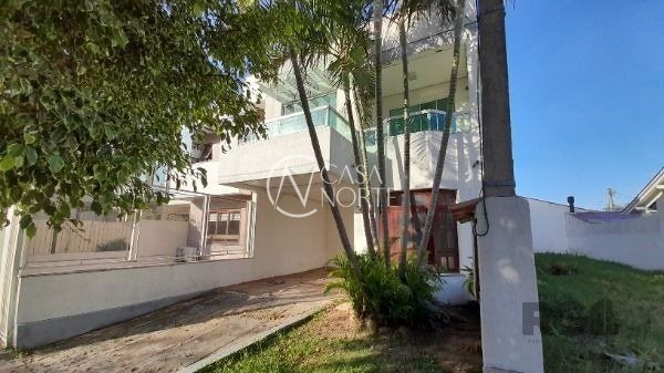 Casa à venda com 3 quartos, 190m², 1 suíte, 2 vagas, Rua Samuel Wainstein no bairro Hípica em Porto Alegre