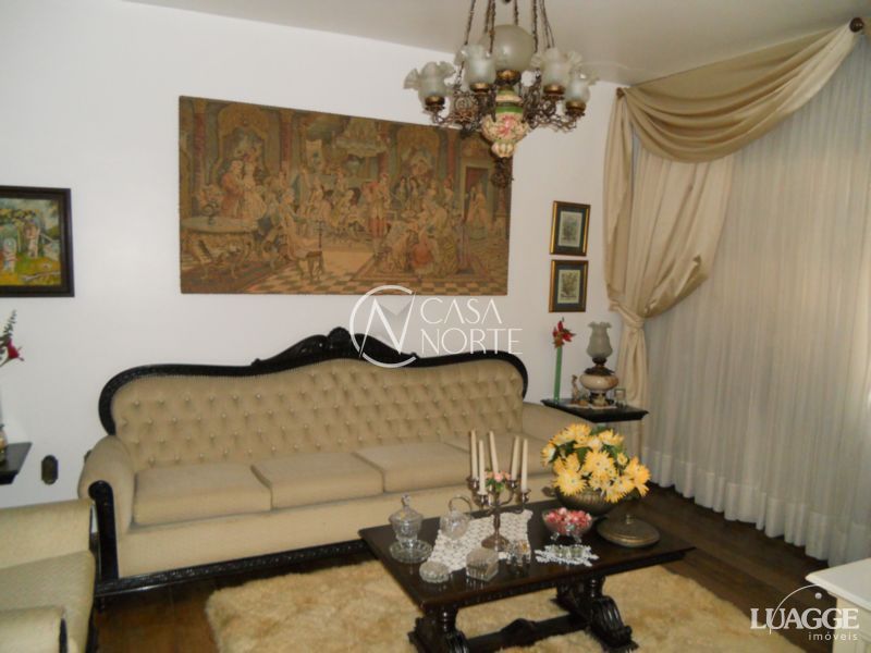 Casa à venda com 3 quartos, 283m², 1 suíte, 4 vagas, Rua Correa Lima no bairro Santa Tereza em Porto Alegre