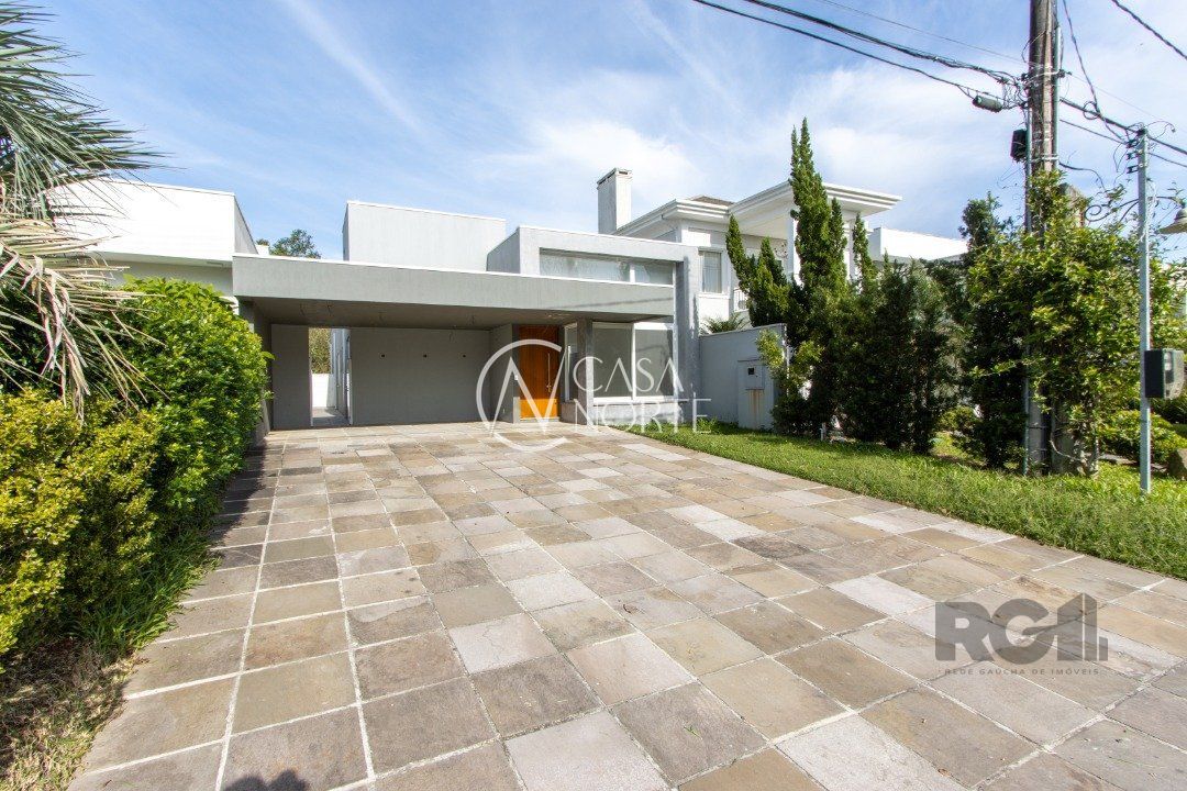 Casa de Condomínio à venda com 3 quartos, 160m², 3 suítes, 2 vagas, Avenida Juca Batista no bairro Belém Novo em Porto Alegre