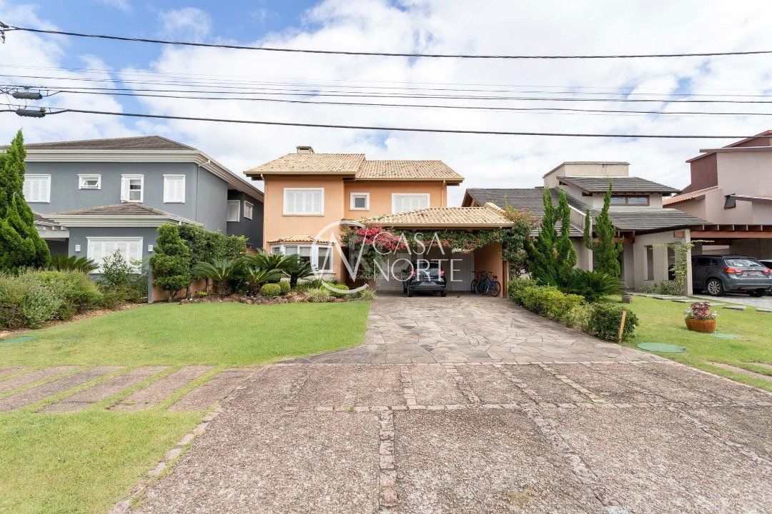 Casa de Condomínio à venda com 4 quartos, 386m², 4 suítes, 4 vagas, Avenida Juca Batista no bairro Belém Novo em Porto Alegre