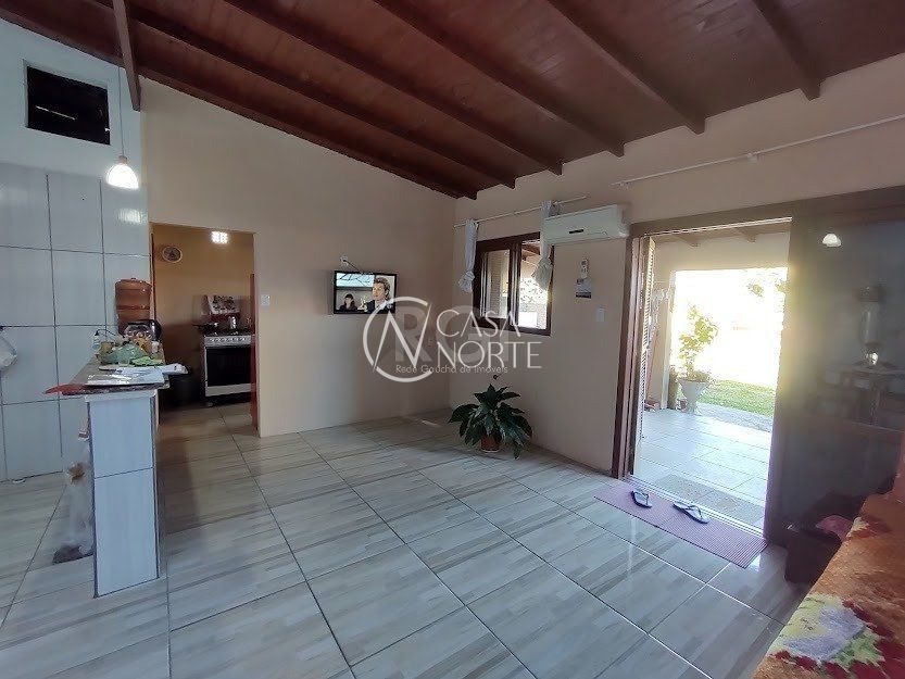 Casa à venda com 2 quartos, 156m², 3 vagas, Rua dos Biazetto no bairro Campo Novo em Porto Alegre