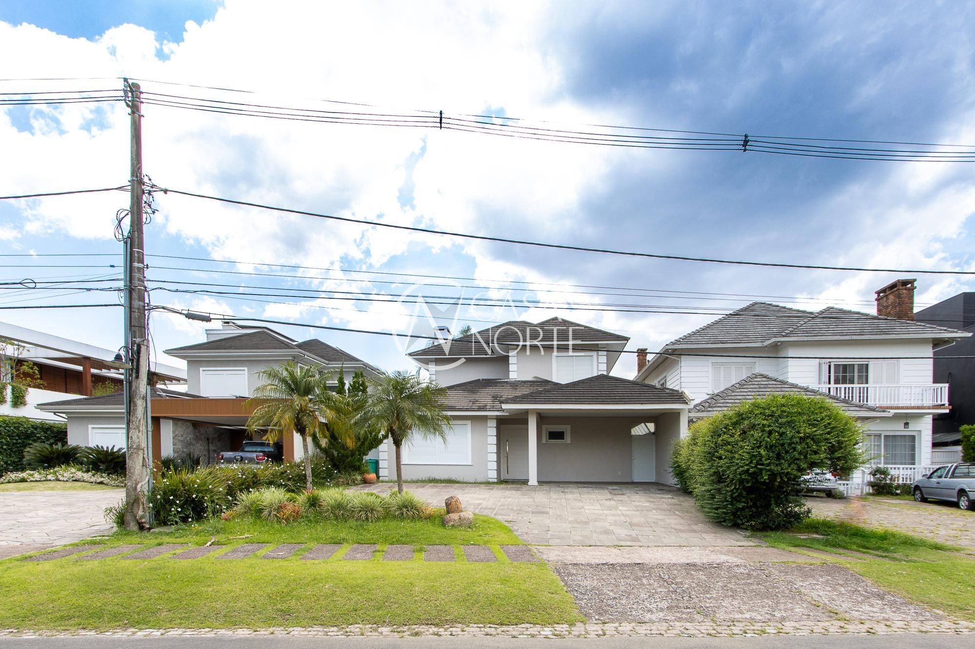Casa de Condomínio à venda com 4 quartos, 350m², 4 suítes, 5 vagas, Avenida Juca Batista no bairro Belém Novo em Porto Alegre