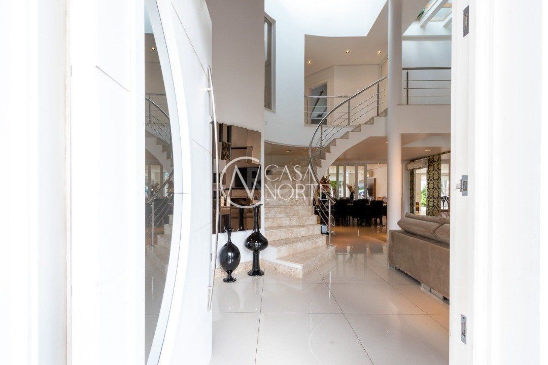 Casa à venda com 4 quartos, 463m², 4 suítes, 4 vagas, Rua Engenheiro Jorge Porto no bairro Ipanema em Porto Alegre