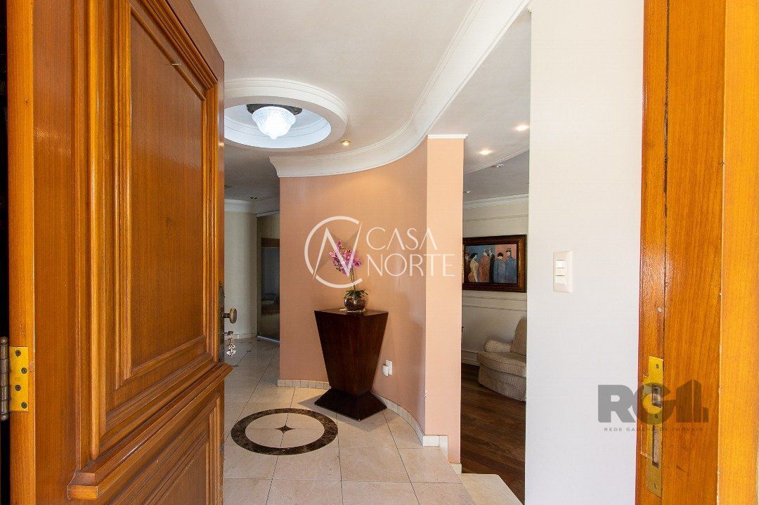 Casa à venda com 4 quartos, 450m², 4 suítes, 5 vagas, Rua Chiriguano no bairro Vila Assunção em Porto Alegre