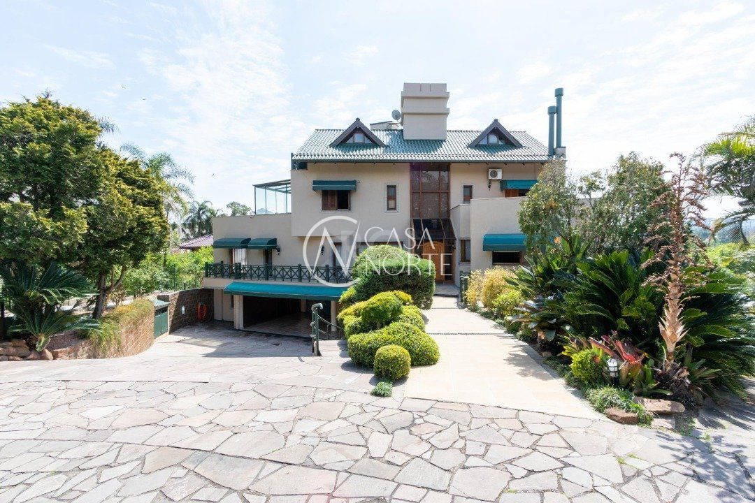 Casa de Condomínio à venda com 6 quartos, 784m², 2 suítes, 6 vagas, Avenida da Cavalhada no bairro Cavalhada em Porto Alegre
