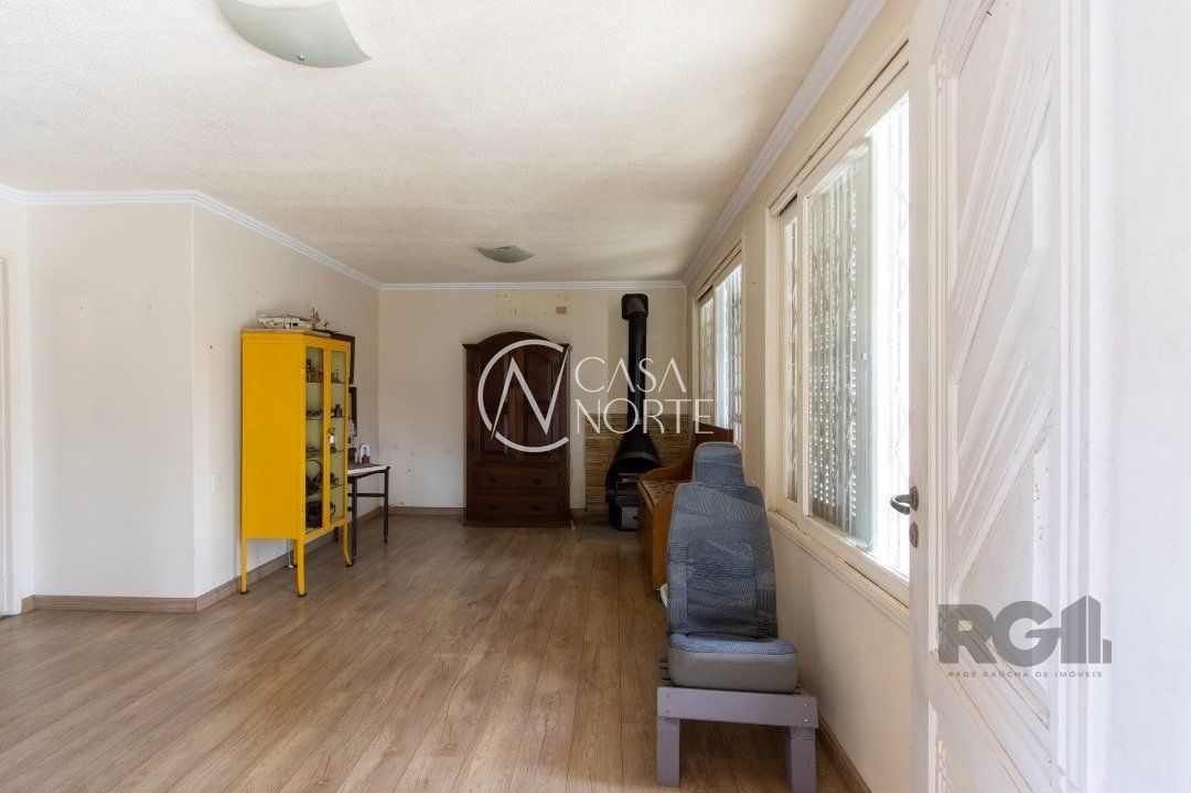 Casa à venda com 5 quartos, 239m², 1 suíte, 2 vagas, Rua Alvaro Pedro da Rosa no bairro Aberta dos Morros em Porto Alegre