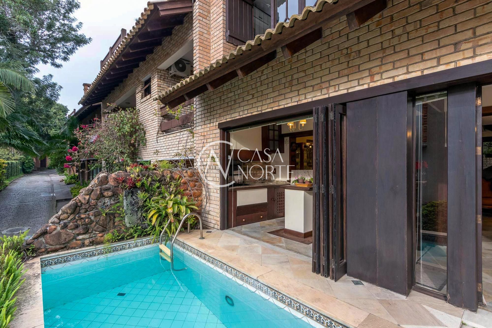 Casa de Condomínio à venda com 3 quartos, 421m², 3 suítes, 4 vagas, Rua Carlos Júlio Becker no bairro Tristeza em Porto Alegre