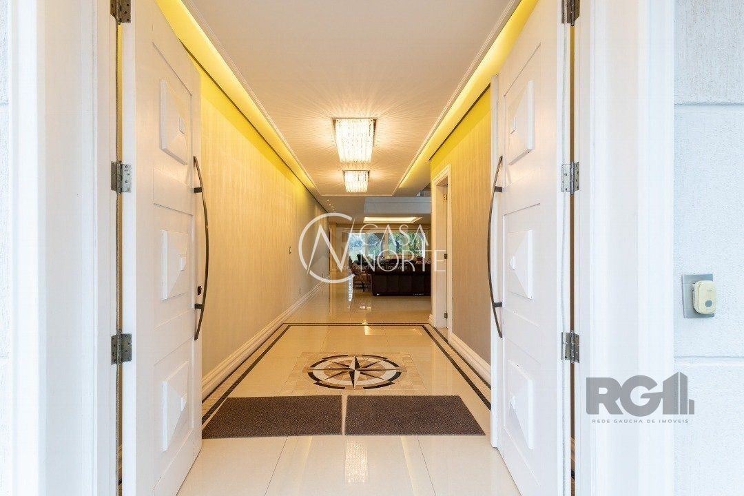 Casa de Condomínio à venda com 3 quartos, 420m², 2 suítes, 4 vagas, Avenida Juca Batista no bairro Belém Novo em Porto Alegre