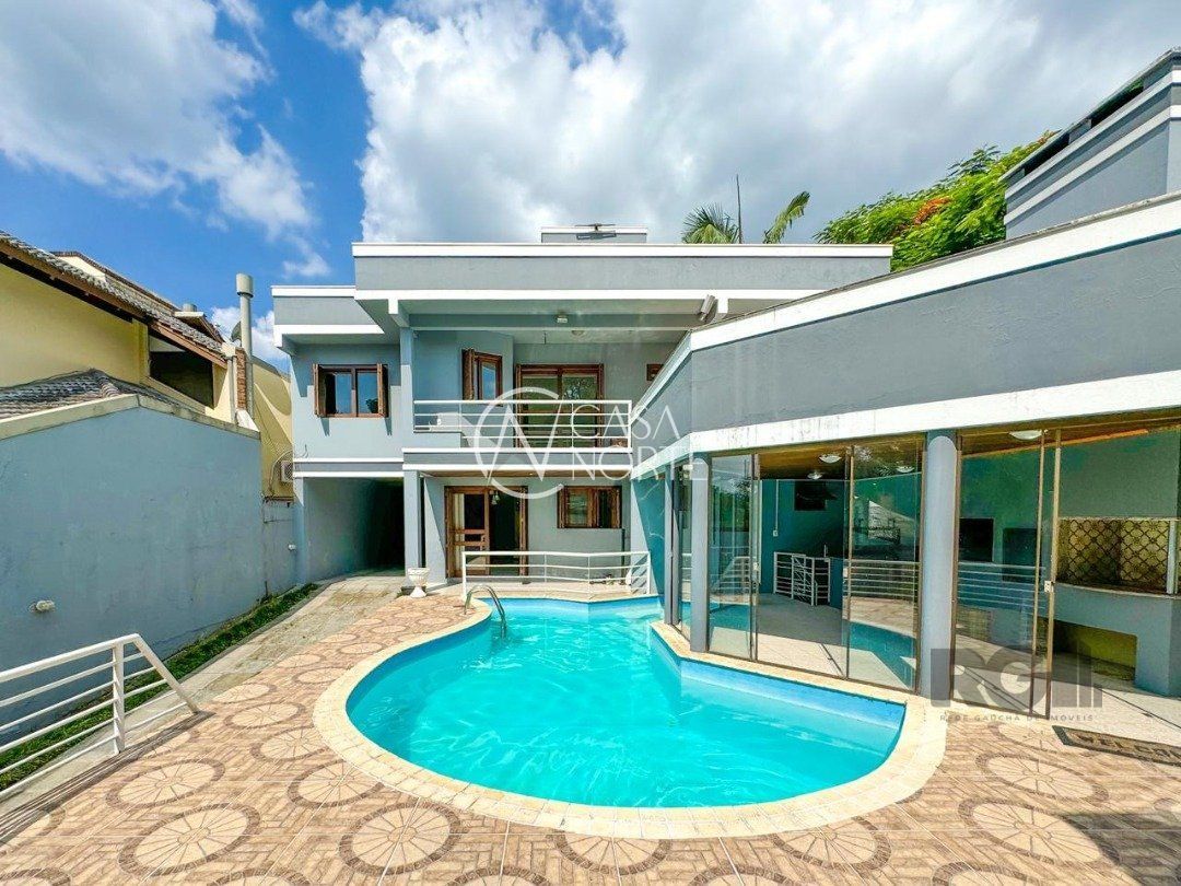 Casa de Condomínio à venda com 4 quartos, 435m², 4 suítes, 6 vagas, Rua Tocantins no bairro Lomba do Pinheiro em Porto Alegre