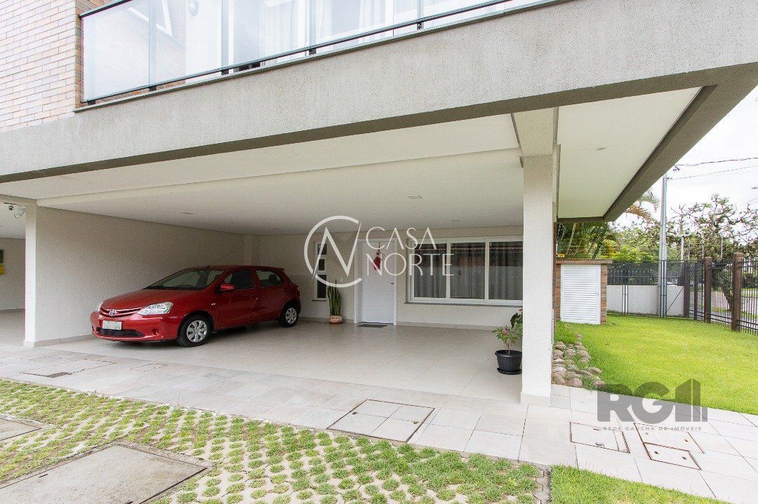 Casa de Condomínio à venda com 3 quartos, 268m², 3 suítes, 2 vagas, Avenida Pereira Passos no bairro Vila Assunção em Porto Alegre