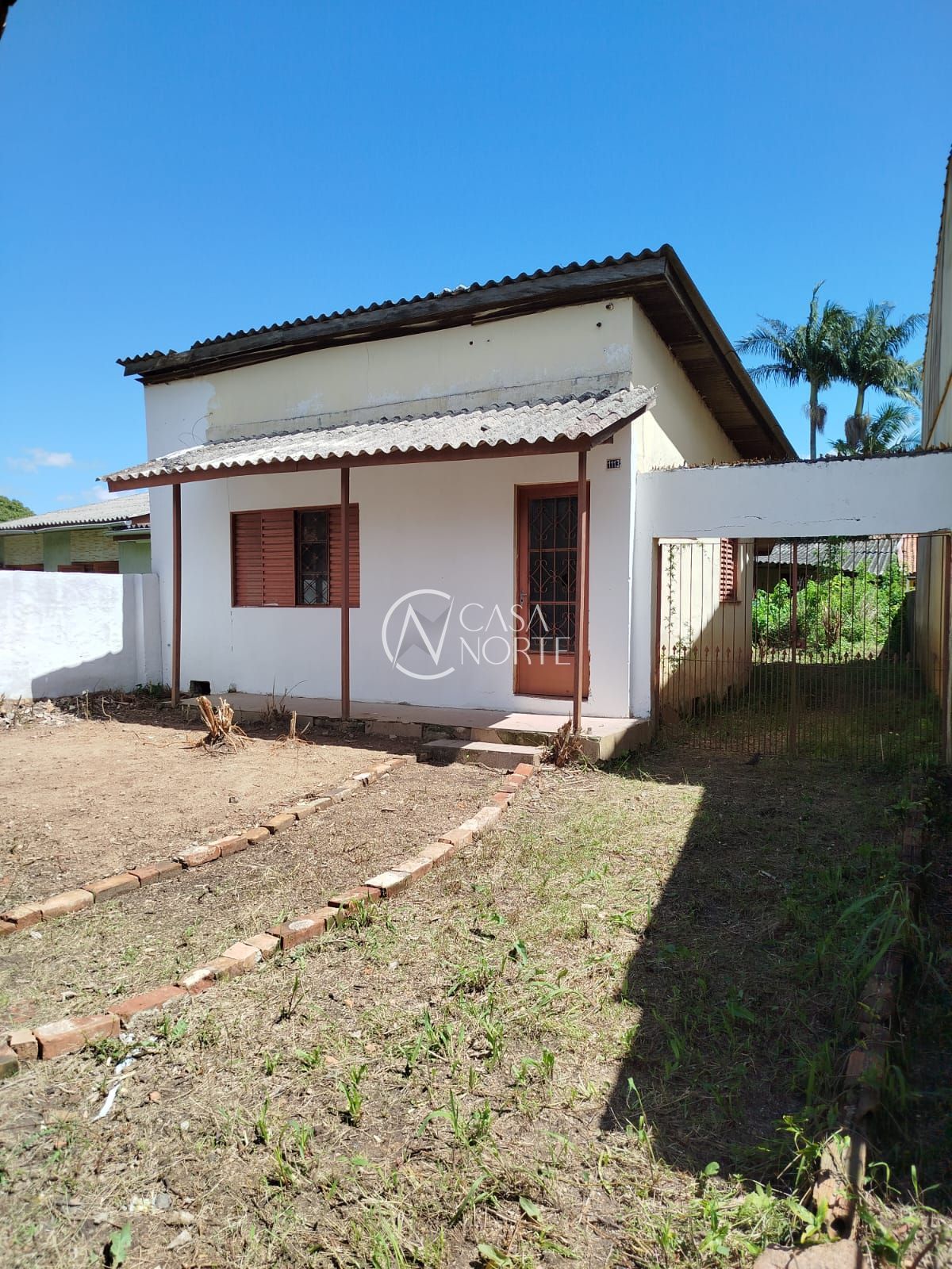 Casa à venda com 1 quarto, 58m², 2 vagas, Rua dos Guenoas no bairro Guarujá em Porto Alegre