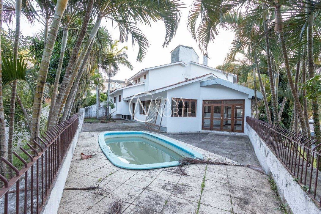 Casa à venda com 4 quartos, 558m², 4 suítes, 6 vagas, Rua Doutor Guilherme Schultz Filho no bairro Jardim Isabel em Porto Alegre