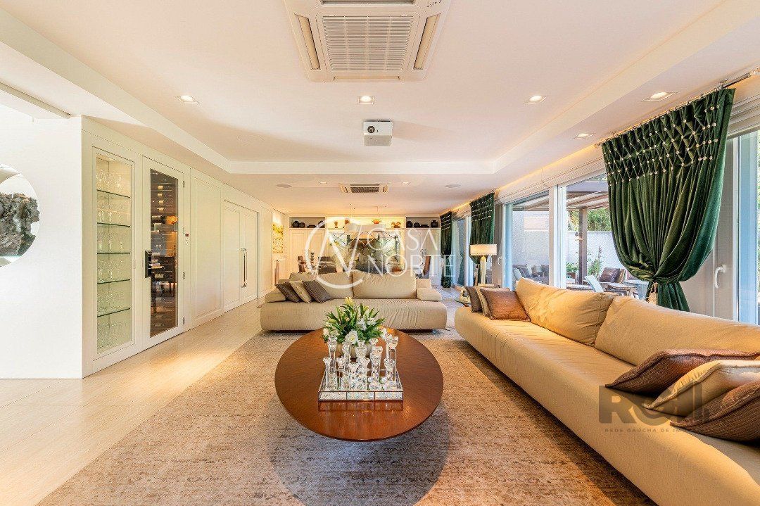 Casa de Condomínio à venda com 3 quartos, 513m², 3 suítes, 4 vagas, Rua Sargento Nicolau Dias de Farias no bairro Tristeza em Porto Alegre