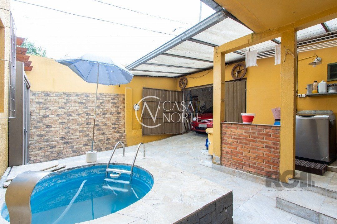 Casa à venda com 3 quartos, 90m², 1 suíte, 3 vagas, Rua Marcos Wainstein no bairro Vila Nova em Porto Alegre