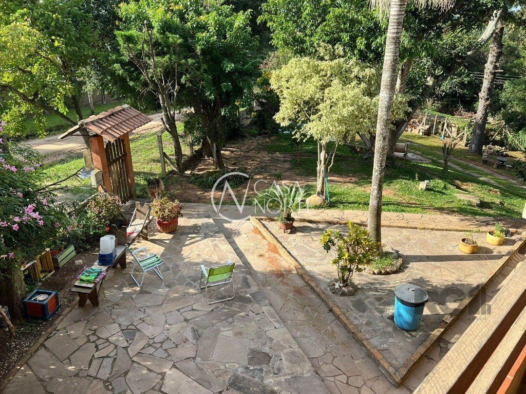 Casa à venda com 4 quartos, 350m², 2 suítes, 9 vagas, Rua Pedro de Oliveira Franca no bairro Hípica em Porto Alegre