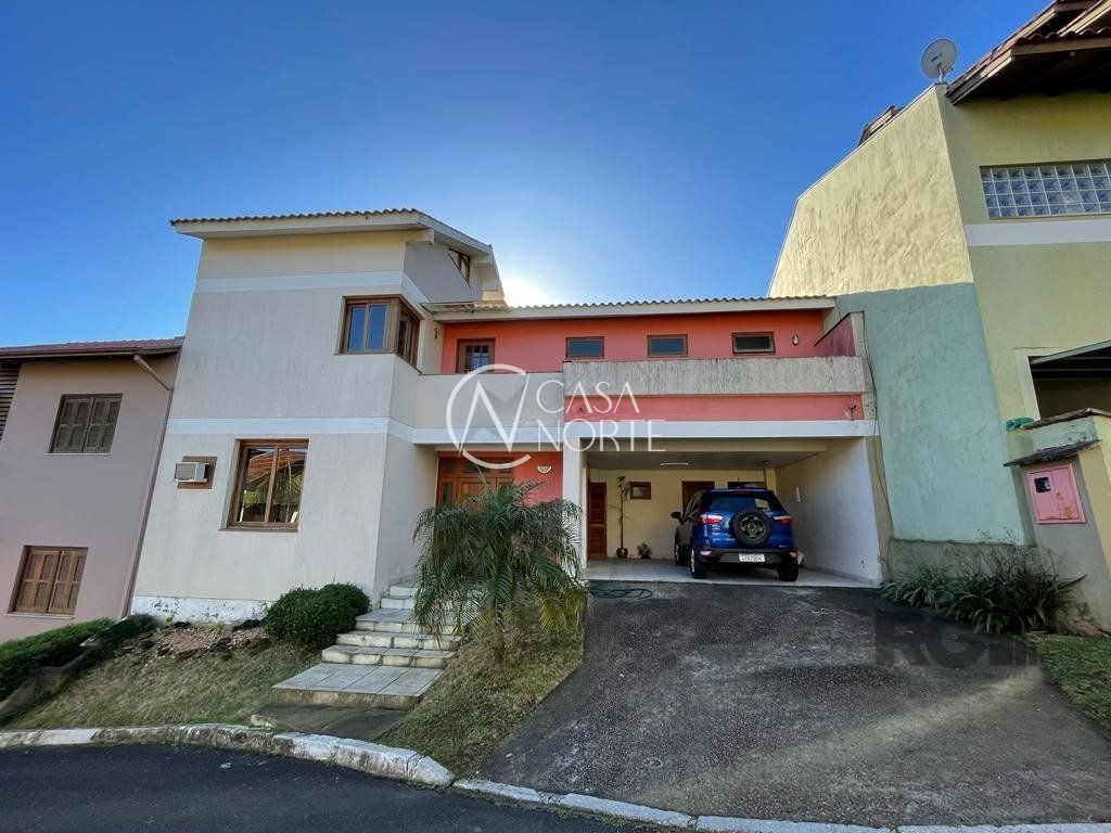 Casa de Condomínio à venda com 4 quartos, 267m², 1 suíte, 2 vagas, Avenida Vicente Monteggia no bairro Cavalhada em Porto Alegre