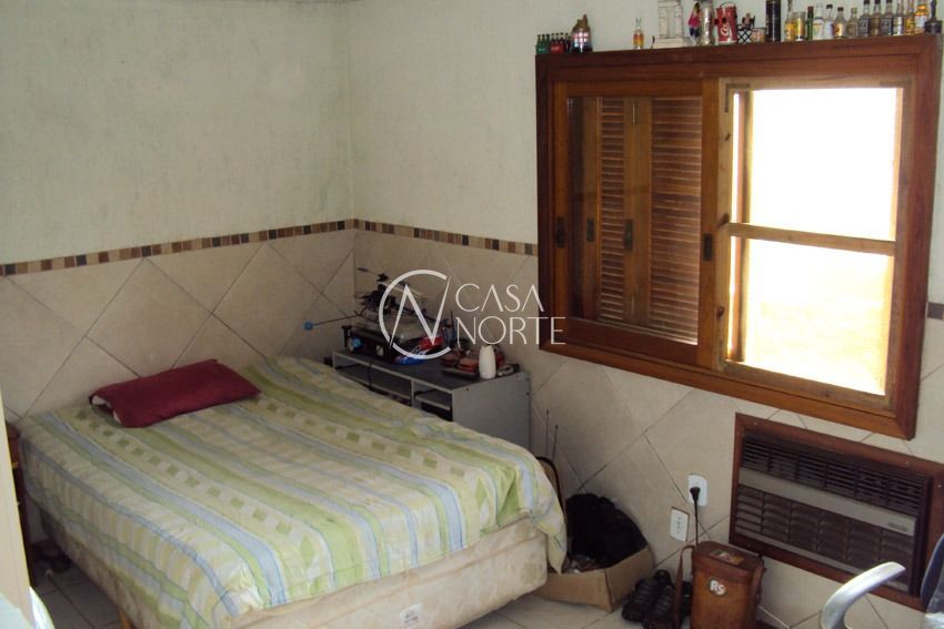 Casa à venda com 3 quartos, 300m², 1 suíte, 2 vagas, Rua Tunel Verde no bairro Ponta Grossa em Porto Alegre