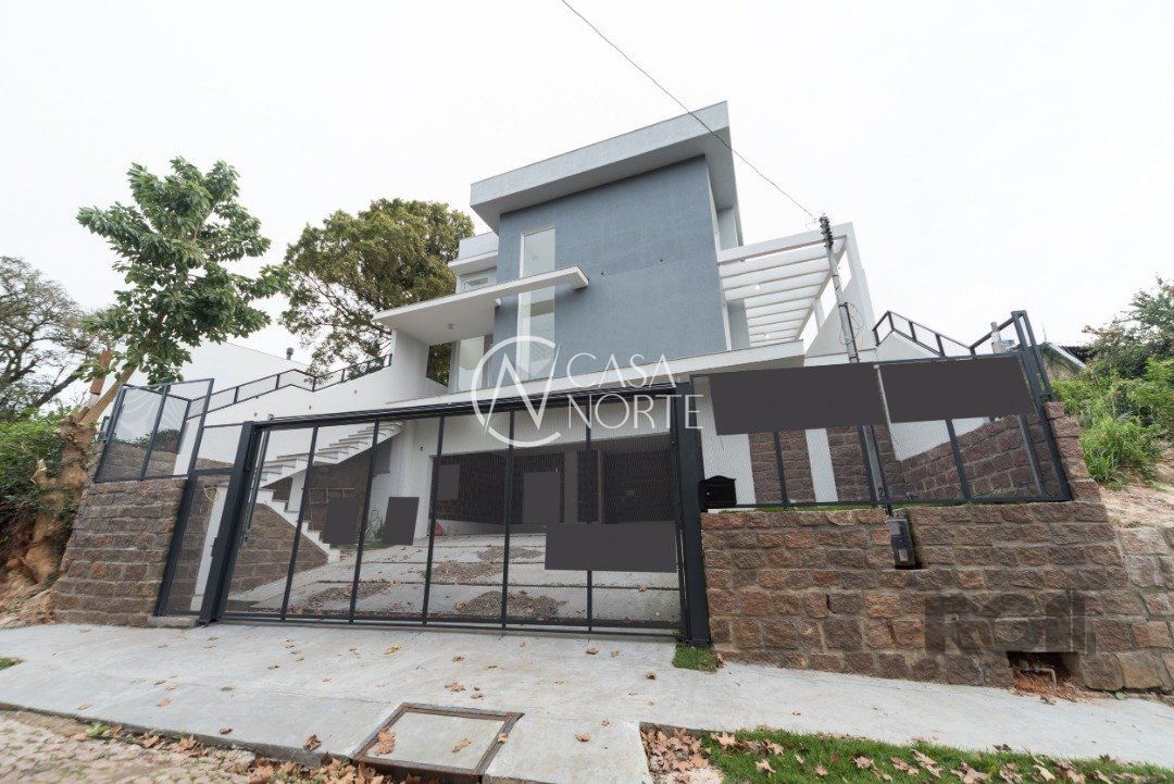 Casa à venda com 3 quartos, 287m², 1 suíte, 3 vagas, Rua Professor Emílio Meyer no bairro Vila Conceição em Porto Alegre