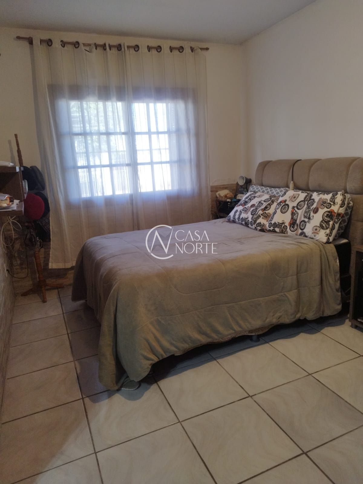 Casa à venda com 2 quartos, 198m², 1 suíte, 3 vagas, Rua Dona Otília no bairro Santa Tereza em Porto Alegre