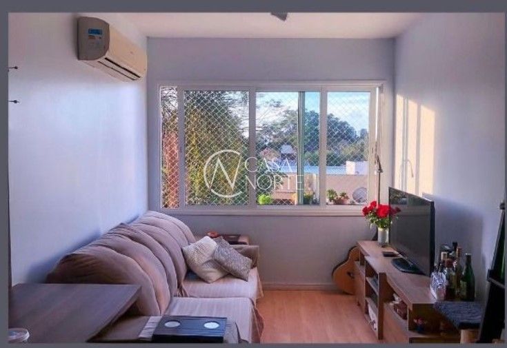 Apartamento à venda com 2 quartos, 58m², 1 suíte, 1 vaga, Rua Coronel Aristides no bairro Camaquã em Porto Alegre