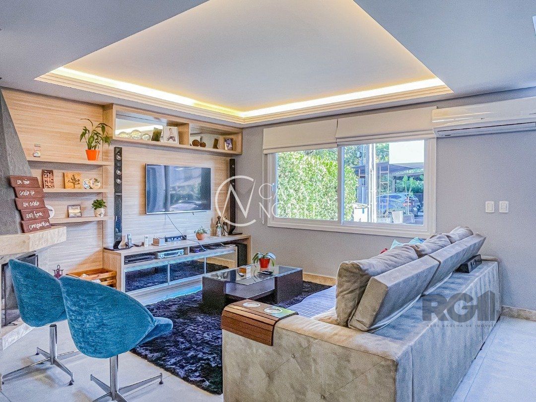 Casa de Condomínio à venda com 4 quartos, 247m², 4 suítes, 2 vagas, Rua Carlos Maximiliano Fayet no bairro Hípica em Porto Alegre