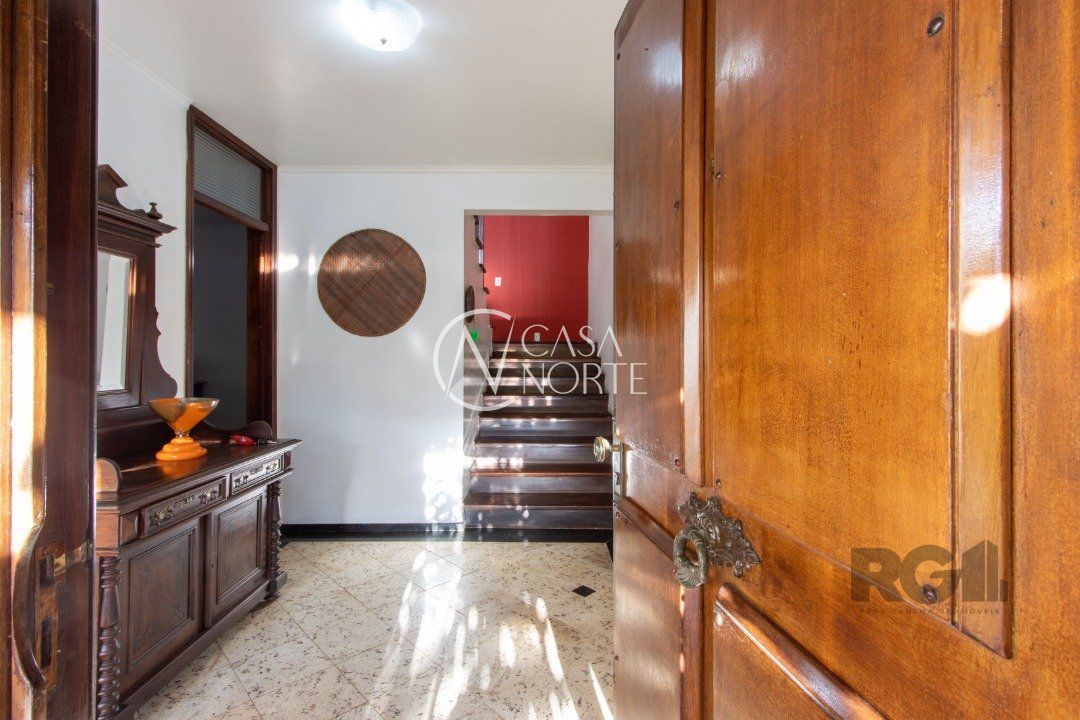 Casa de Condomínio à venda com 3 quartos, 375m², 1 suíte, 4 vagas, Rua Sinke no bairro Santa Tereza em Porto Alegre