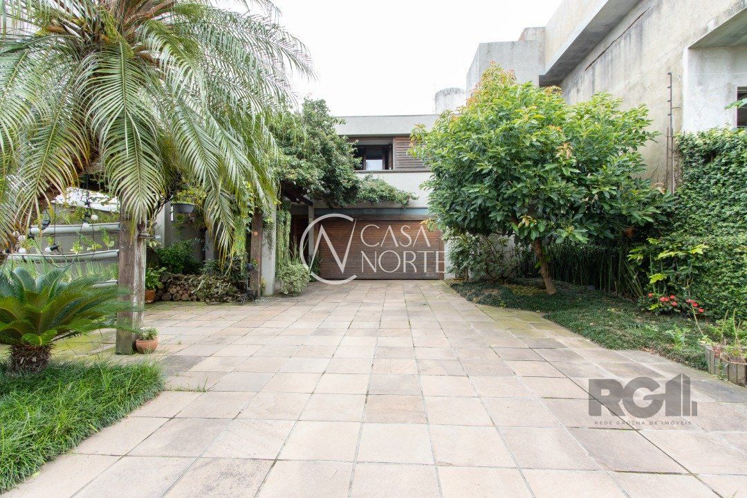 Casa à venda com 4 quartos, 360m², 4 suítes, 4 vagas, Rua Curupaiti no bairro Cristal em Porto Alegre