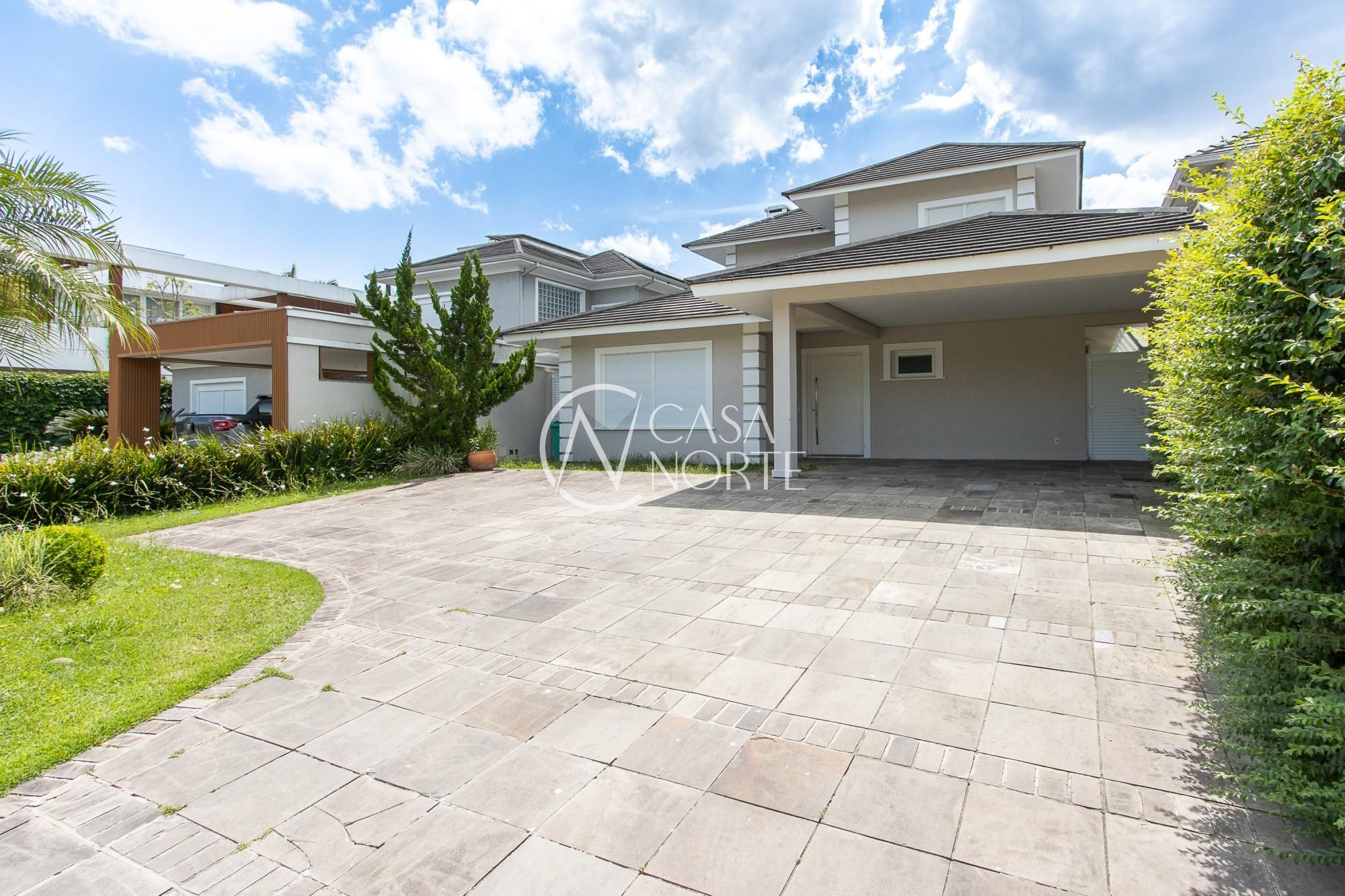 Casa de Condomínio à venda com 4 quartos, 350m², 4 suítes, 5 vagas, Avenida Juca Batista no bairro Belém Novo em Porto Alegre