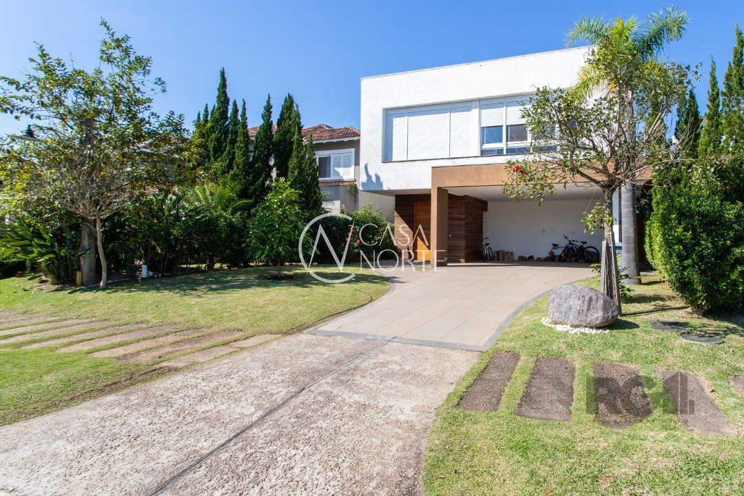 Casa de Condomínio à venda com 3 quartos, 426m², 3 suítes, 2 vagas, Avenida Juca Batista no bairro Belém Novo em Porto Alegre