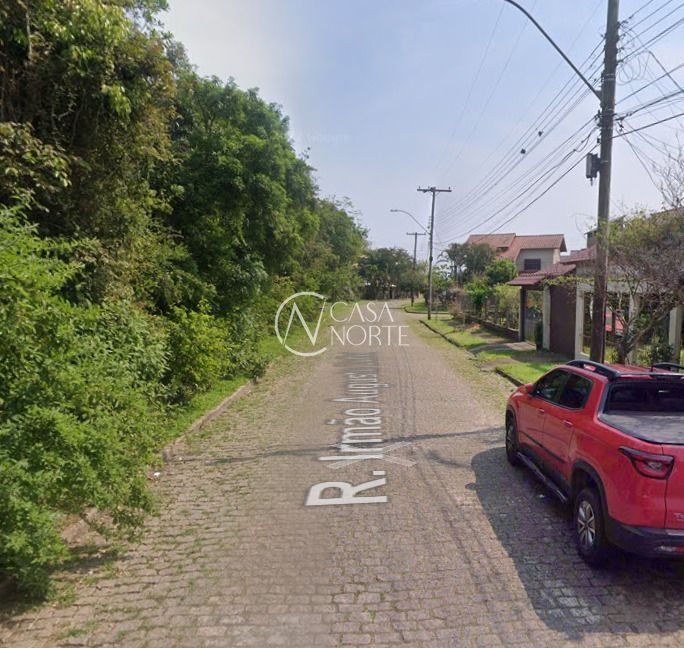 Casa à venda com 4 quartos, 275m², 1 suíte, 2 vagas, Rua Irmão Augusto Duflot no bairro Serraria em Porto Alegre
