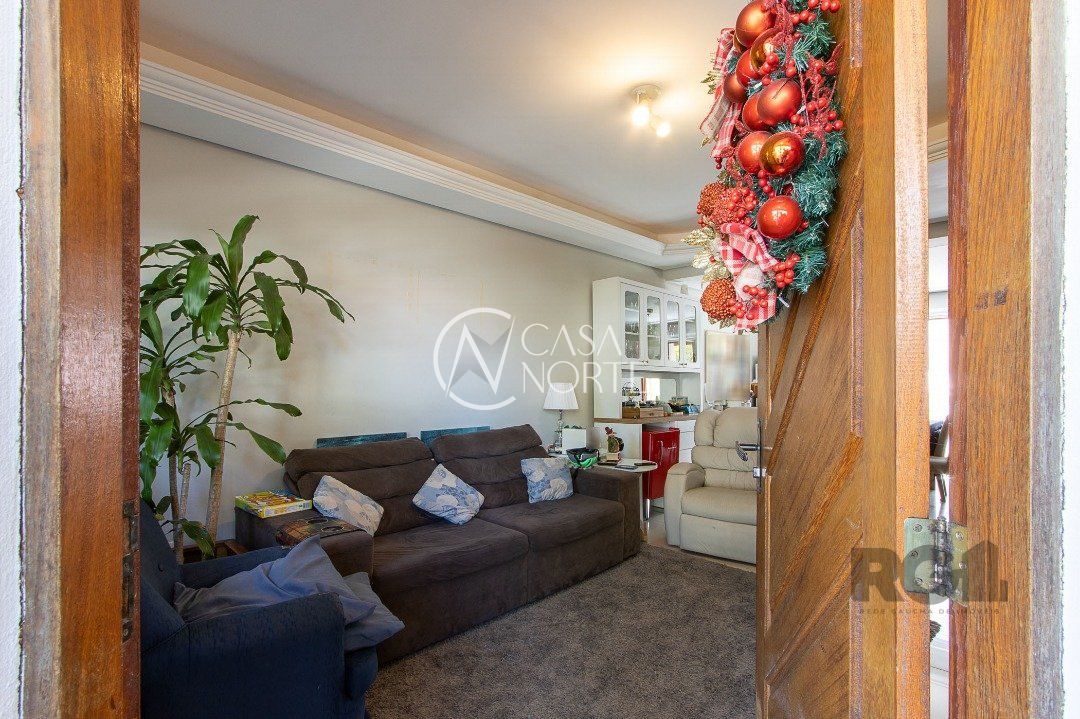 Casa à venda com 3 quartos, 140m², 1 suíte, 2 vagas, Rua Pau-Brasil no bairro Hípica em Porto Alegre