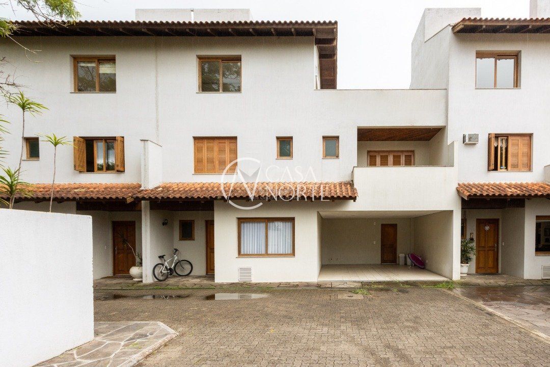 Casa de Condomínio à venda com 4 quartos, 334m², 1 suíte, 2 vagas, Travessa Pedra Redonda no bairro Jardim Isabel em Porto Alegre
