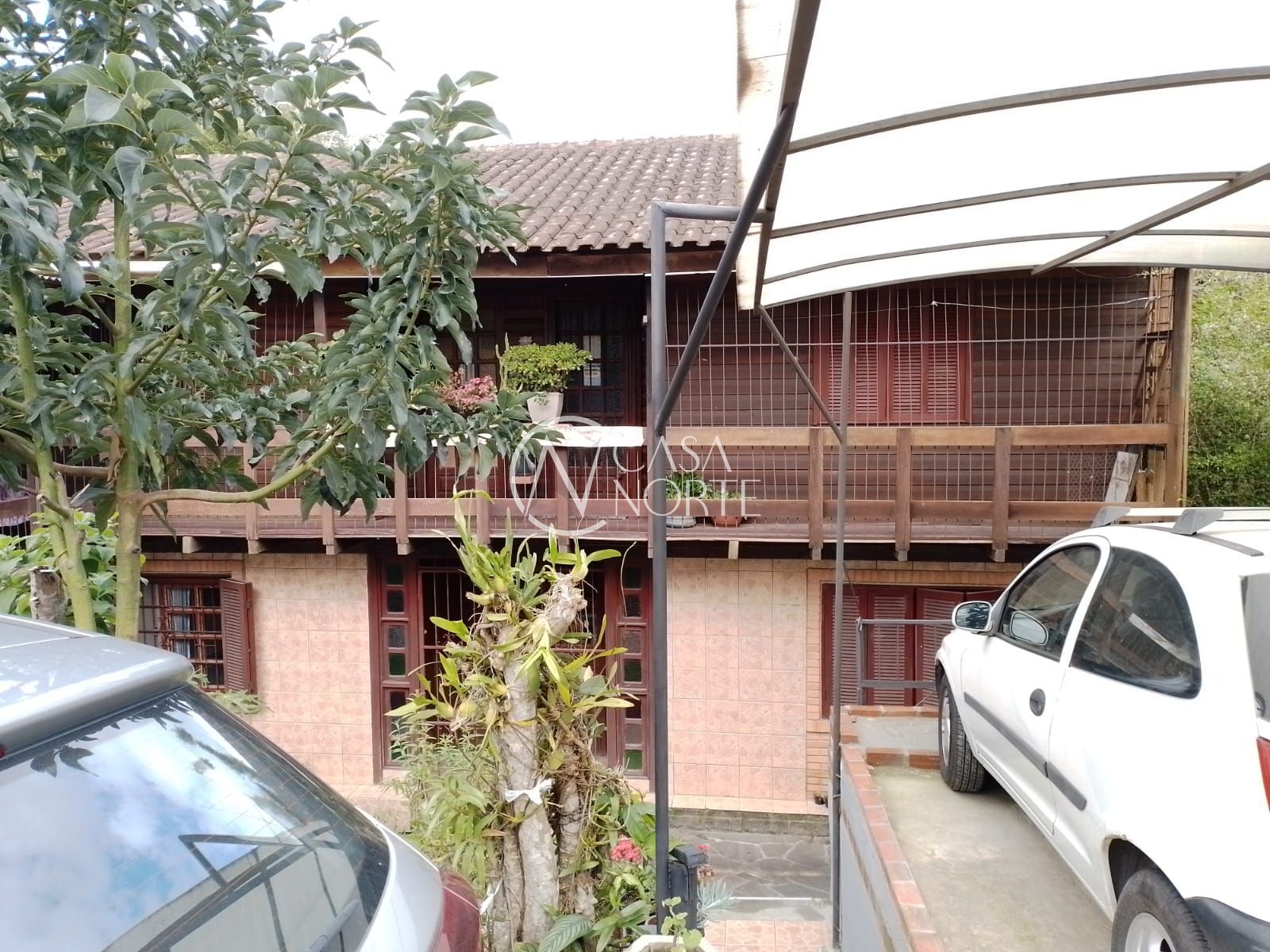 Casa à venda com 4 quartos, 200m², 2 vagas, Estrada João Passuelo no bairro Vila Nova em Porto Alegre