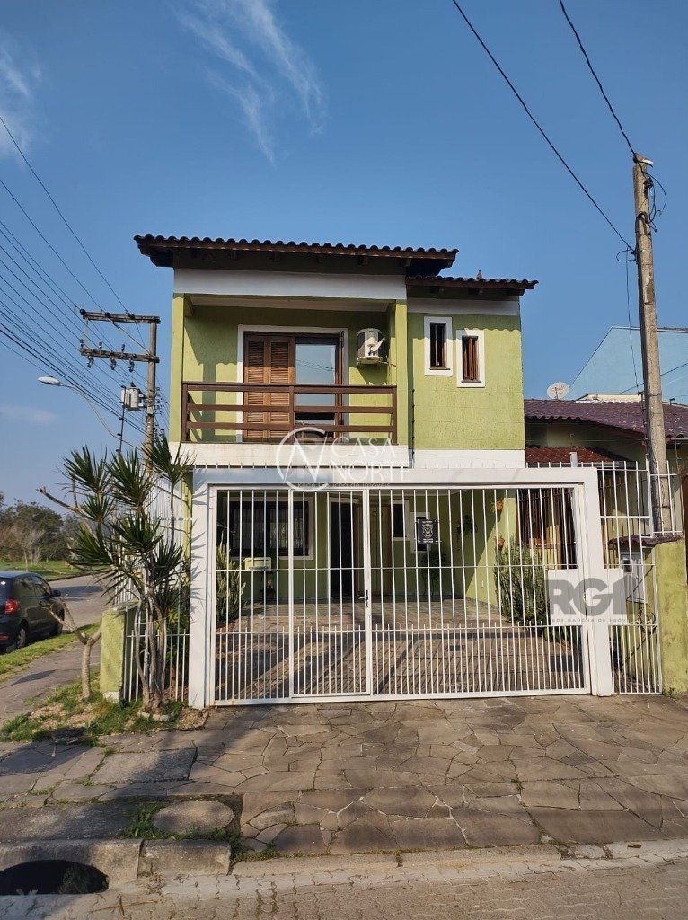 Casa à venda com 3 quartos, 167m², 1 suíte, 7 vagas, Rua Santos Zottis no bairro Hípica em Porto Alegre