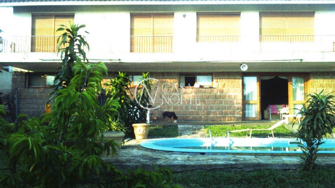 Casa à venda com 7 quartos, 400m², 1 suíte, 2 vagas, Rua Cariri no bairro Vila Assunção em Porto Alegre