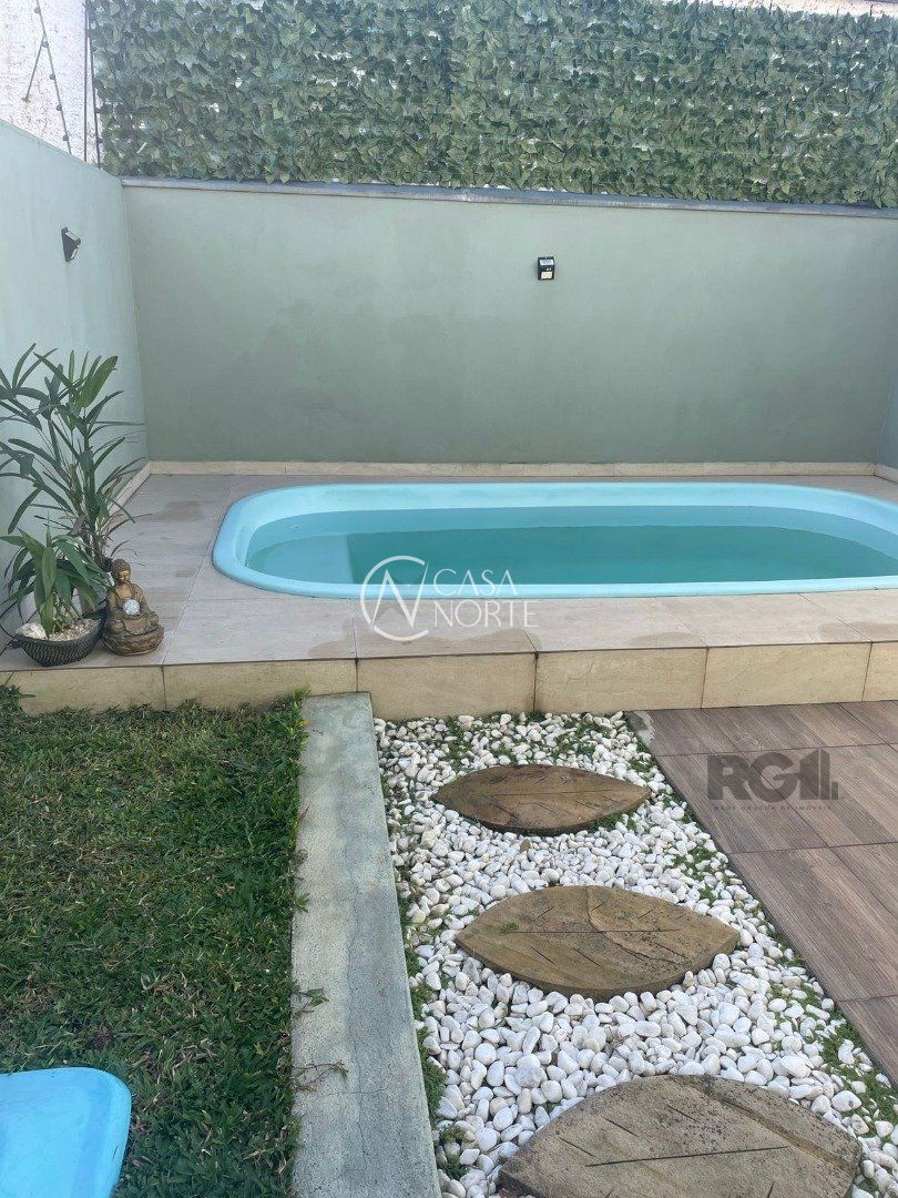 Casa à venda com 3 quartos, 176m², 1 suíte, 2 vagas, Rua Claudio da Silva Pinto no bairro Espírito Santo em Porto Alegre