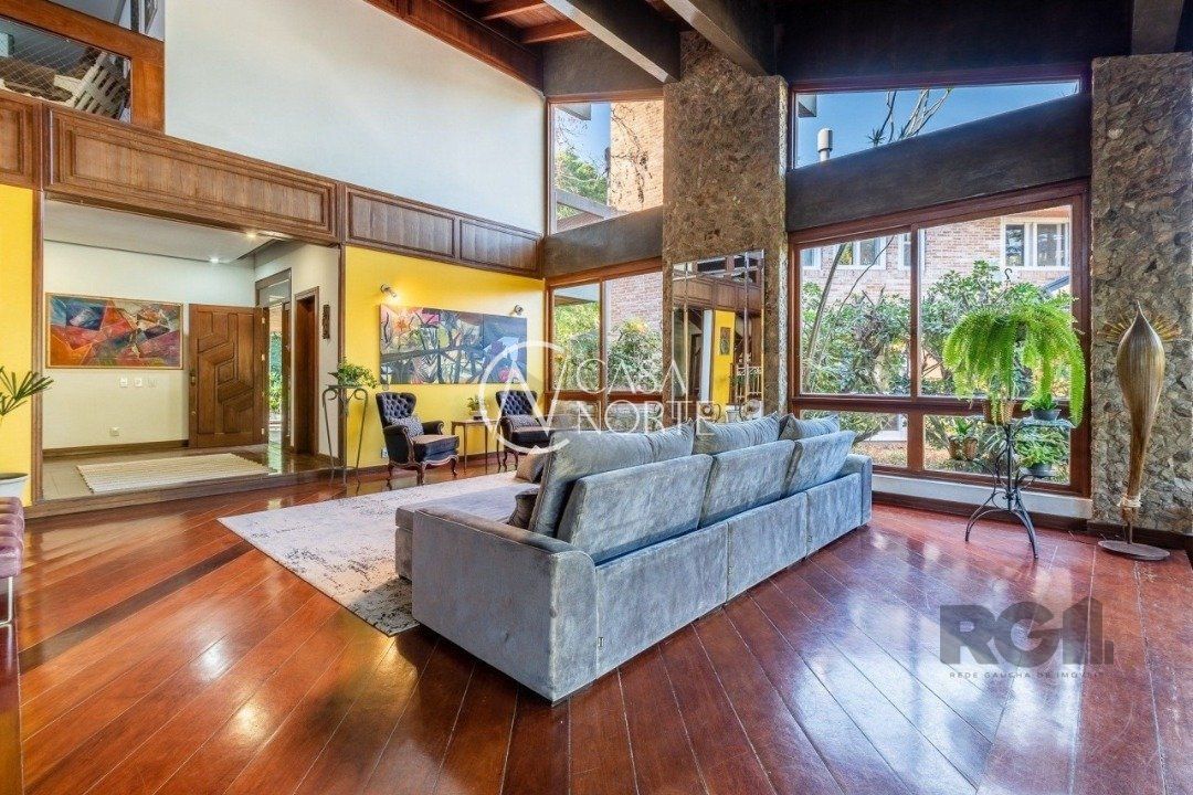 Casa de Condomínio à venda com 4 quartos, 650m², 2 suítes, 5 vagas, Avenida da Cavalhada no bairro Cavalhada em Porto Alegre