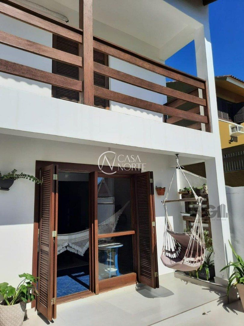 Casa à venda com 3 quartos, 204m², 1 suíte, 3 vagas, Rua Lloyd de Andrade Polidoro no bairro Ipanema em Porto Alegre