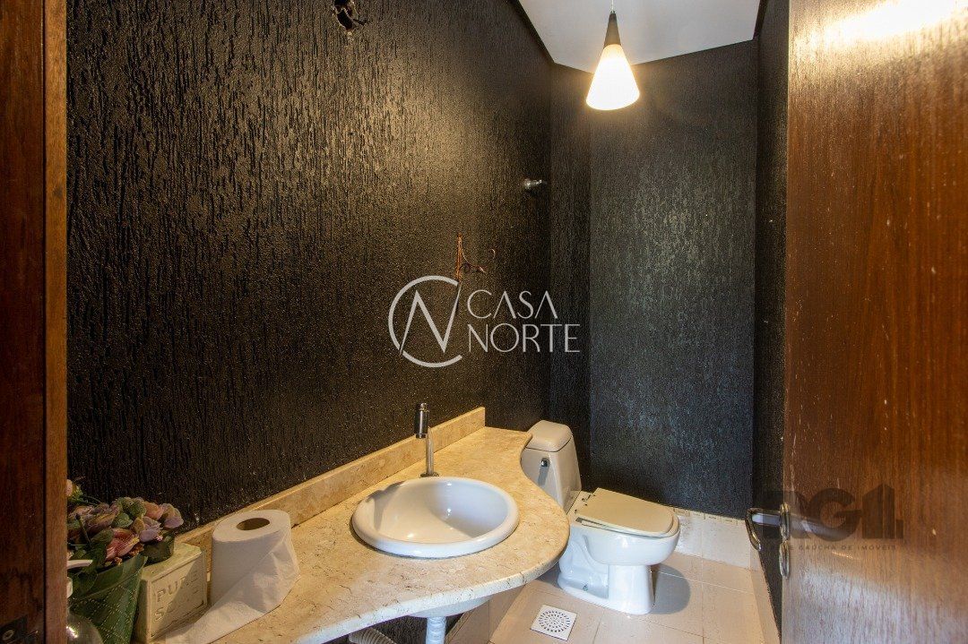 Casa à venda com 4 quartos, 297m², 2 suítes, 3 vagas, Rua Almirante Mariath no bairro Tristeza em Porto Alegre