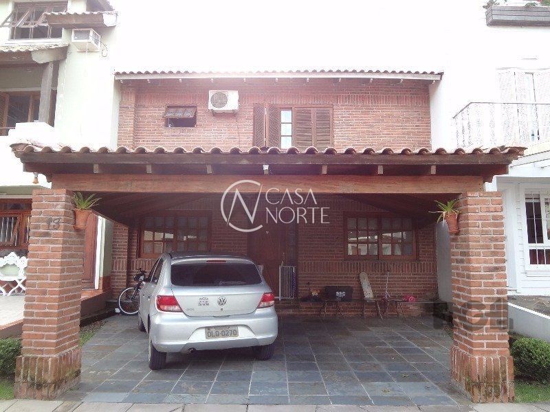 Casa de Condomínio à venda com 3 quartos, 248m², 1 suíte, 2 vagas, Avenida Juca Batista no bairro Cavalhada em Porto Alegre