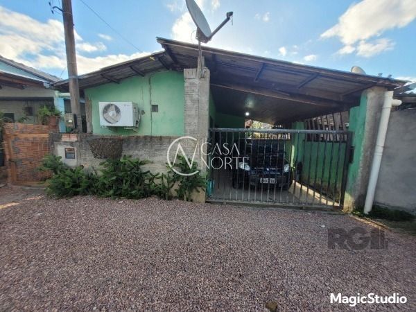 Casa à venda com 2 quartos, 72m², 1 vaga, Rua Cássia Eller no bairro Ponta Grossa em Porto Alegre